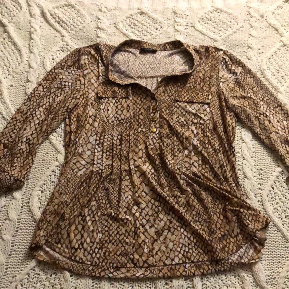 Size medium women’s top. Snake print.
